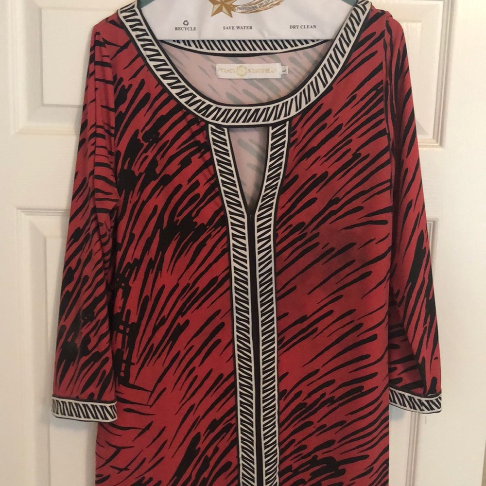 Tracy Negoshian tight fitting low cut dress